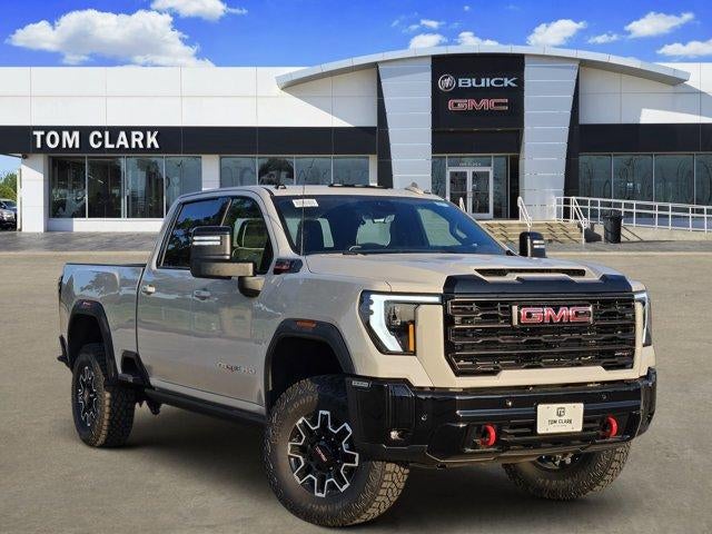 2026 GMC Sierra 2500 HD AT4X in Coastal Dune — front three-quarter view