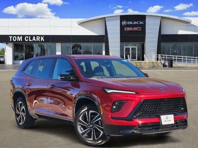 2026 Buick Enclave Sport Touring in Cherry Red Tintcoat — front three-quarter view
