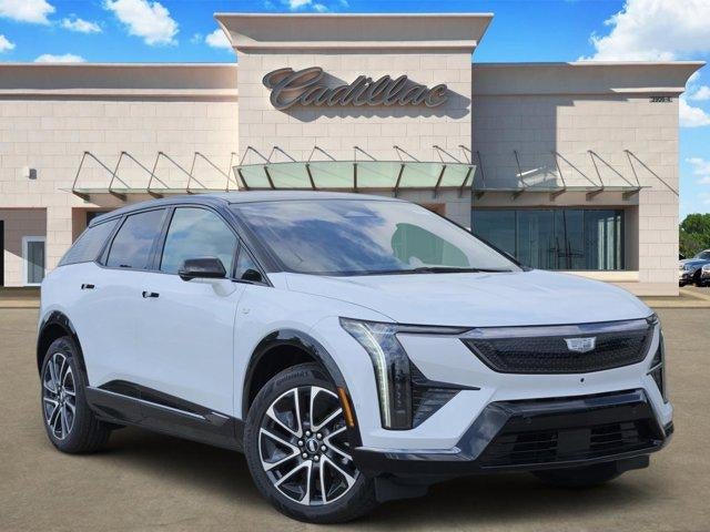 2026 Cadillac OPTIQ Sport in Vibrant White Tricoat — front three-quarter view