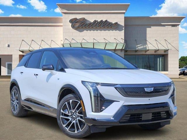 2026 Cadillac OPTIQ Sport in Vibrant White Tricoat — front three-quarter view