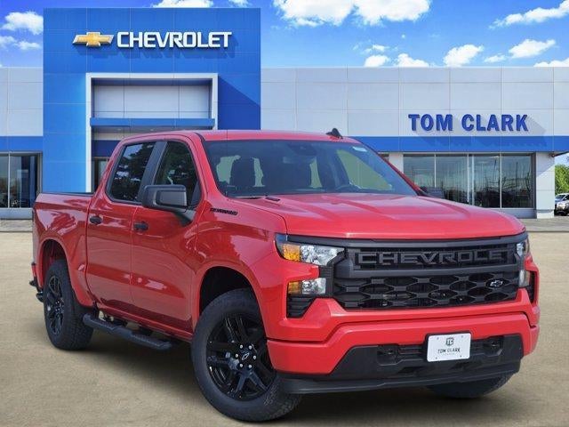 2026 Chevrolet Silverado 1500 Custom in Red Hot — front three-quarter view