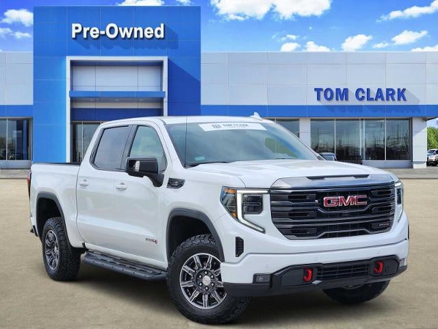 2024 GMC Sierra 1500 AT4 in Summit White — front three-quarter view