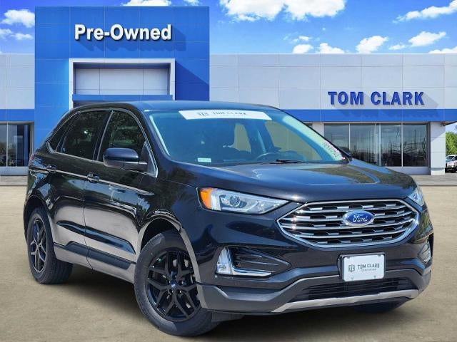 2021 Ford Edge SEL in Black — front three-quarter view