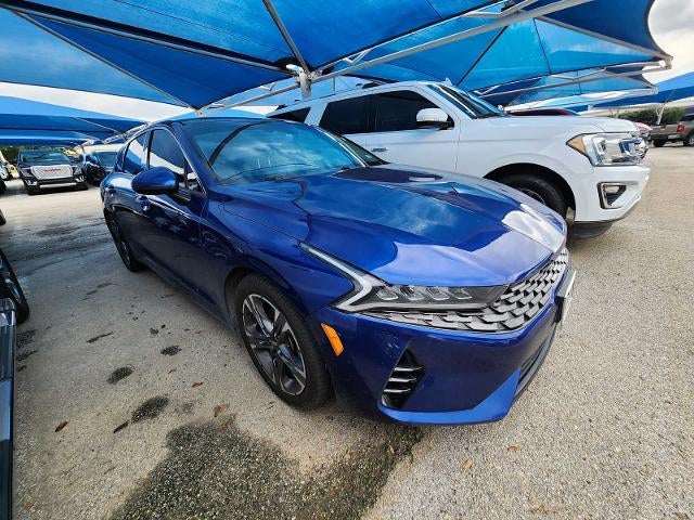 2021 Kia K5 EX in Sapphire Blue — front three-quarter view